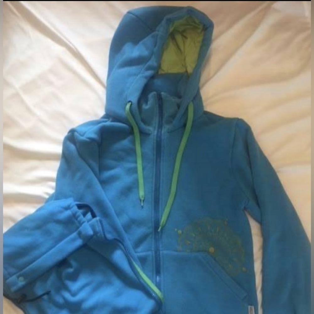 Baby wearing hoodie and wraps